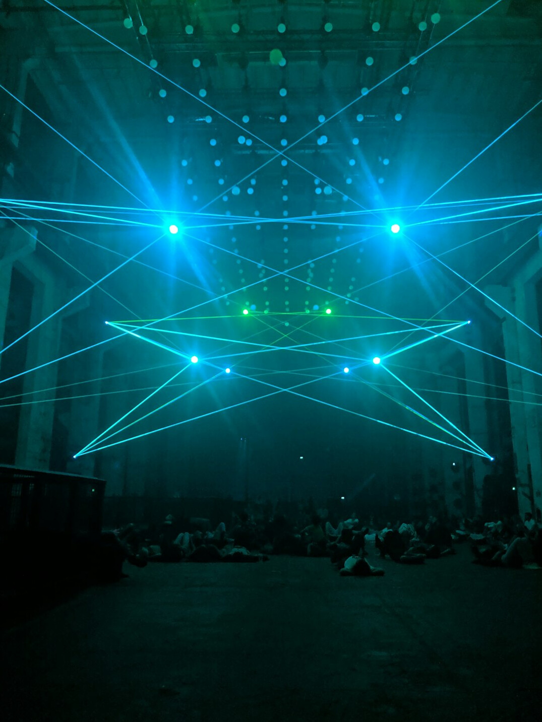 Empty concert stage with colorful spotlights and haze